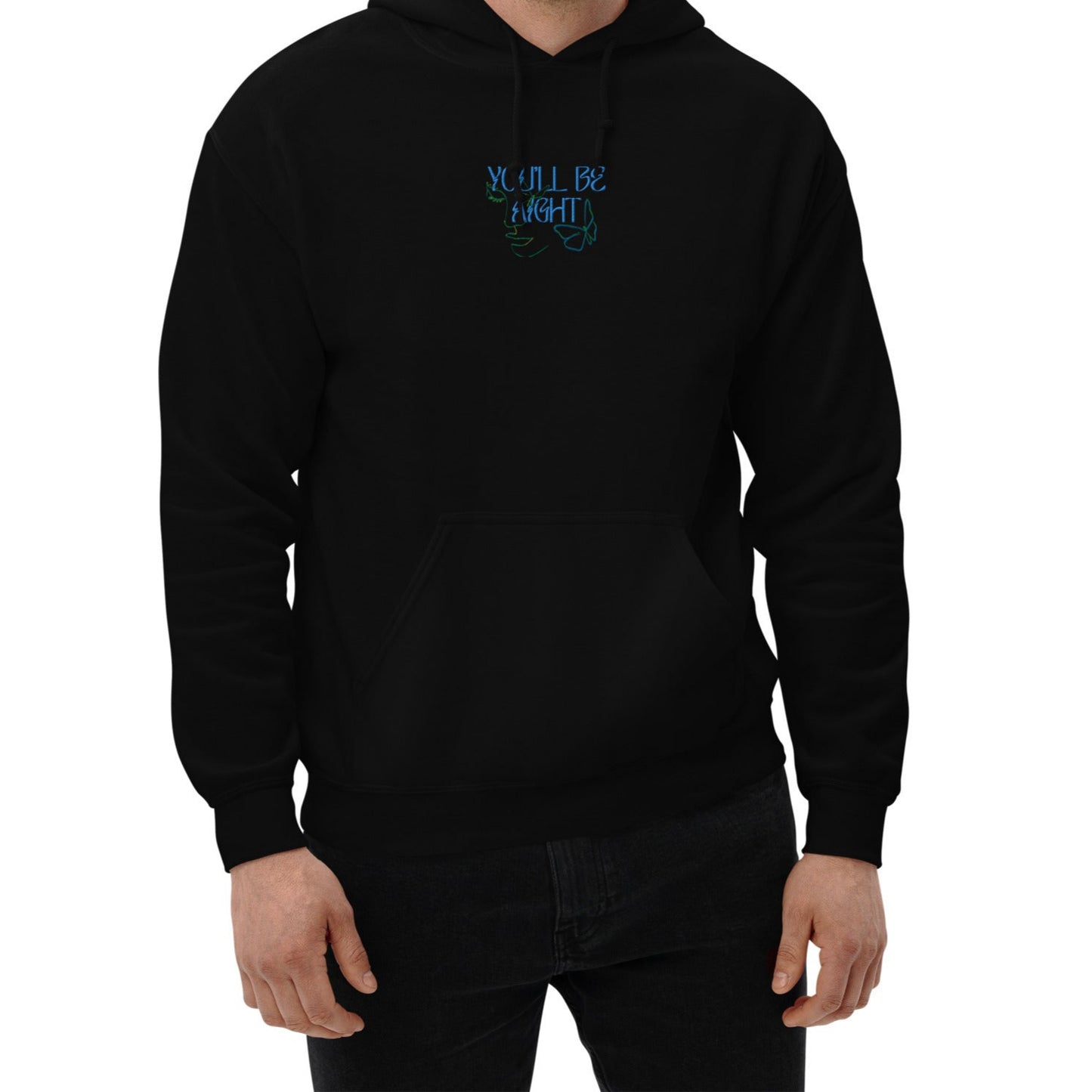Man wearing a black hoodie with text and graphics on a white background